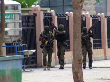 Special forces members are seen during an uprising that led