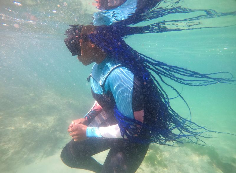 Free diver Zandile Ndlovu explores beneath the waves off Simonstown