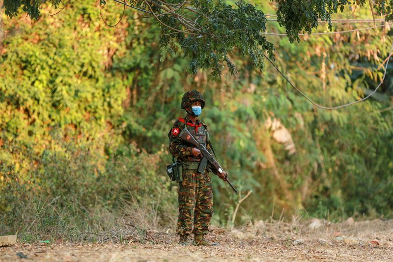 FILE PHOTO: A Myanmar’s soldier stands guard near the congress