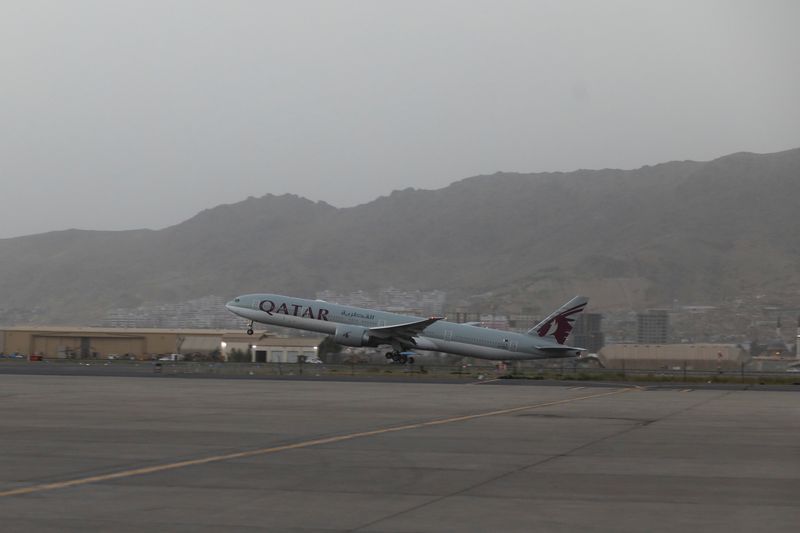 A Qatar Airways flight takes off from the international airport