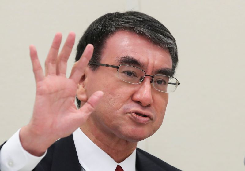 Japan’s Vaccine Minister Taro Kono attends a group interview in