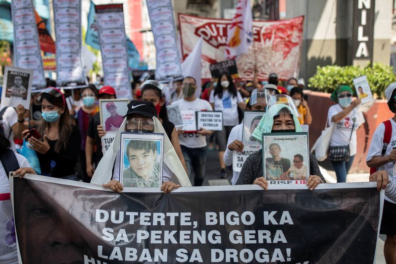 FILE PHOTO: Filipinos hold protest to commemorate Duterte’s final year