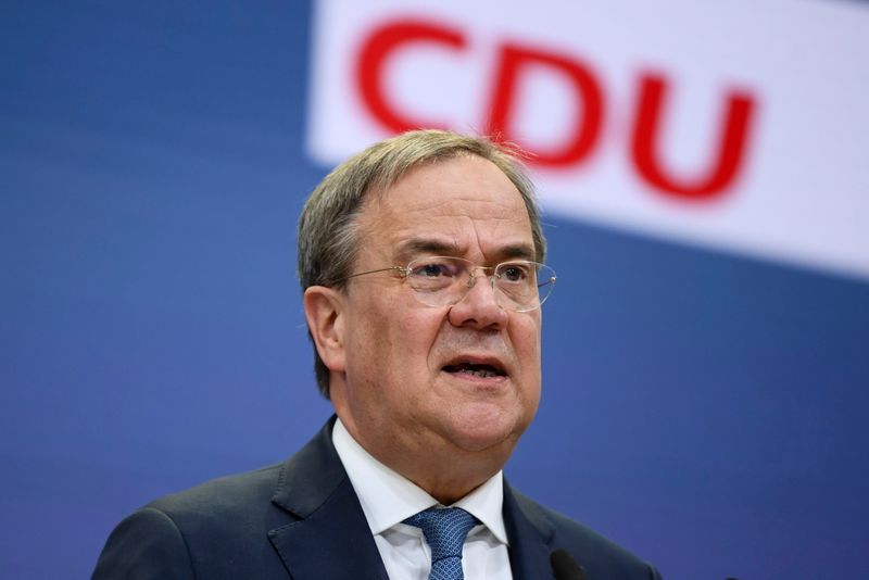 FILE PHOTO: CDU’s candidate for chancellor Armin Laschet holds a