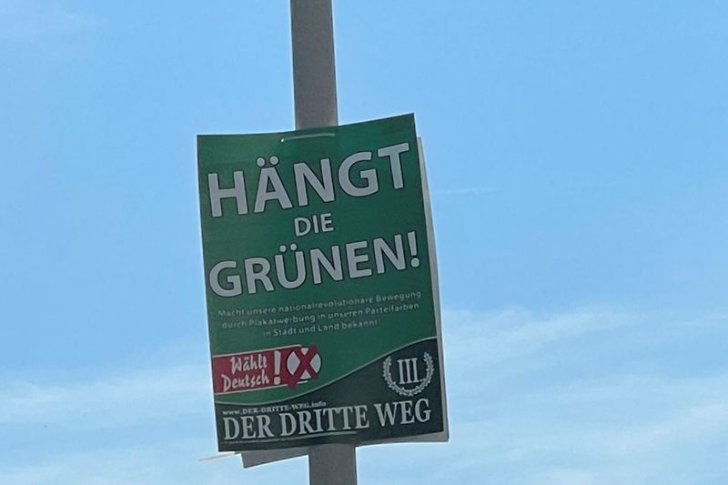 German city seeks to ban far-right ‘Hang the Greens’ posters