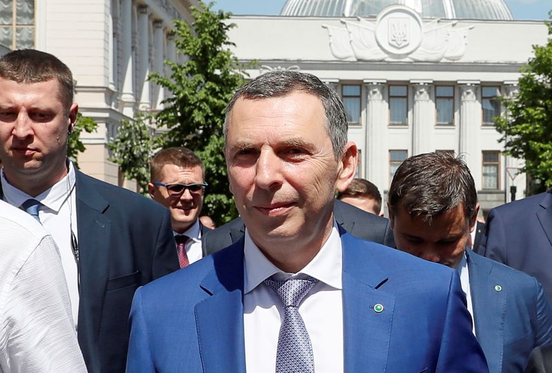 Presidential aide Serhiy Shefir walks after the inauguration in Kyiv