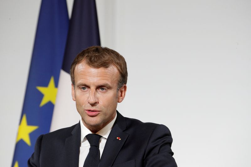 FILE PHOTO: French President Emmanuel Macron delivers a speech during