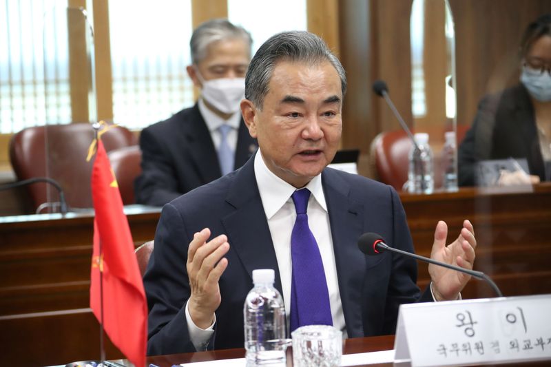 Chinese Foreign Minister Wang Yi speaks during a meeting with