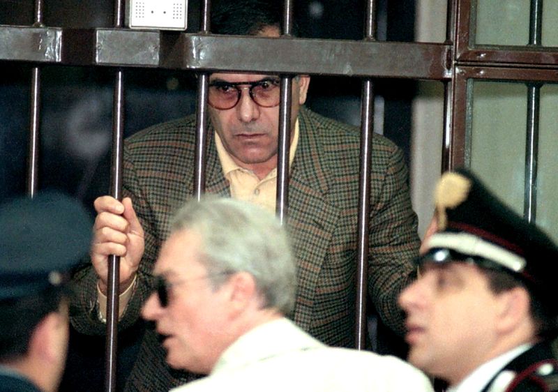 FILE PHOTO: Mafia boss Leoluca Bagarella stand behinds bars at