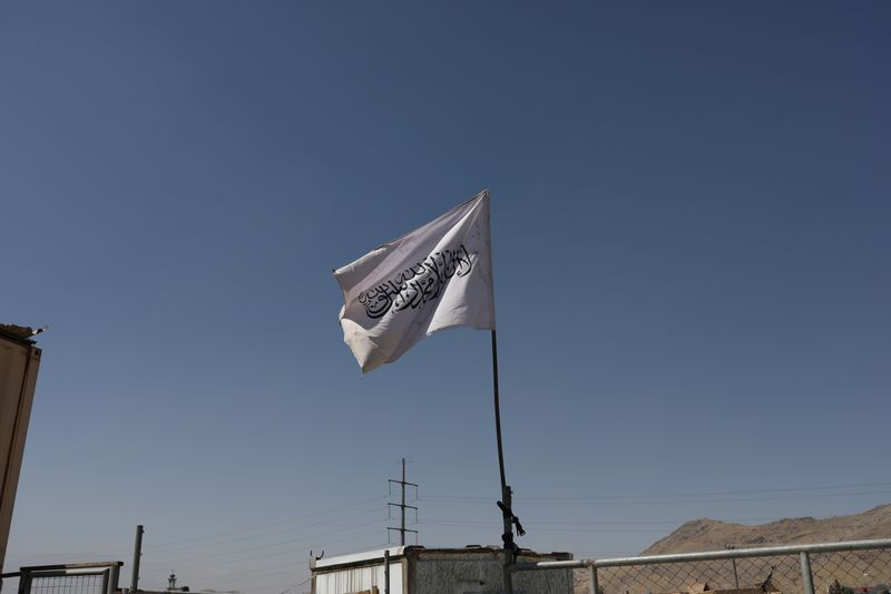 Flag of the Islamic Emirate of Afghanistan (Taliban) is raised