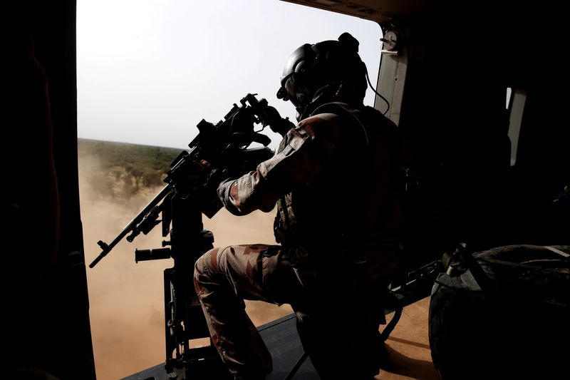 FILE PHOTO: A French soldier mans a machine gun in