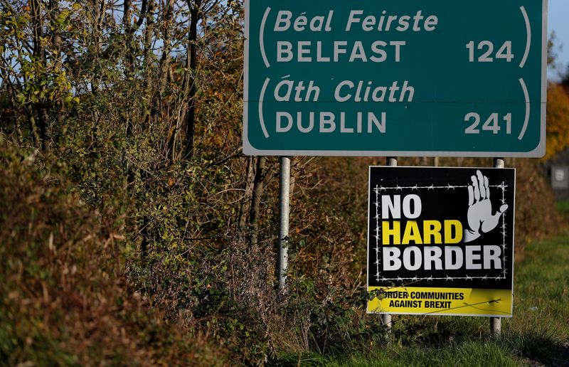 FILE PHOTO: A ‘No Hard Border’ poster is seen below