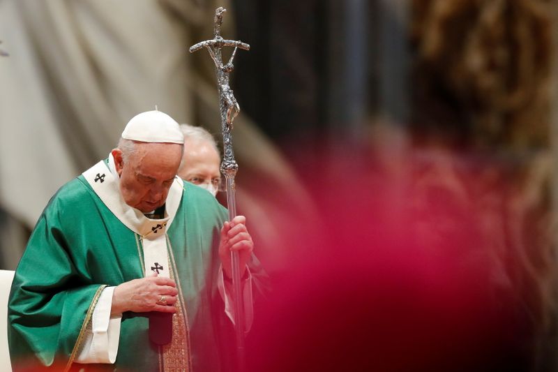 Pope Francis leads a mass to open the synod of