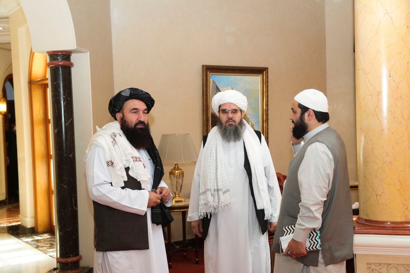 Taliban delegates, Shahabuddin Delawar and Khairullah Khairkhwa are pictured ahead
