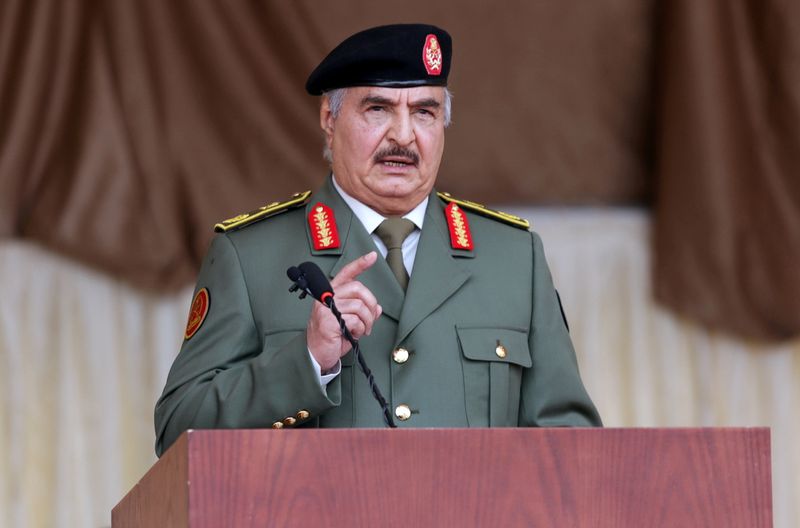 FILE PHOTO: Libyan military commander Khalifa Haftar gestures as he