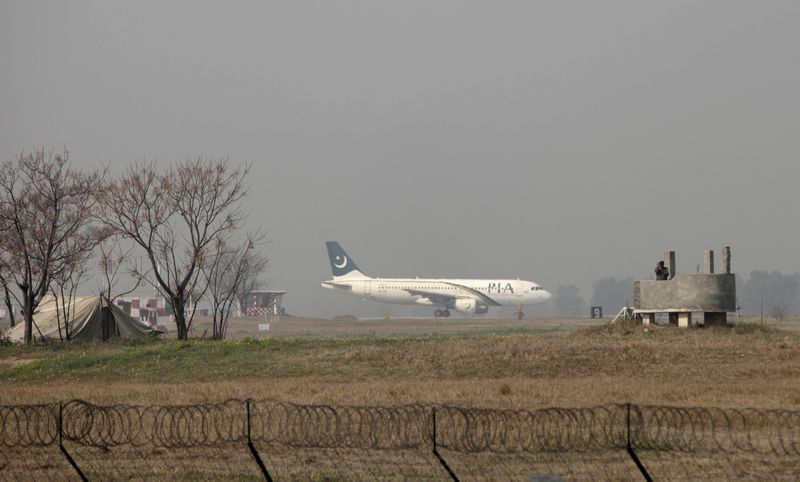 FILE PHOTO: A Pakistan International Airlines (PIA) passenger plane prepares