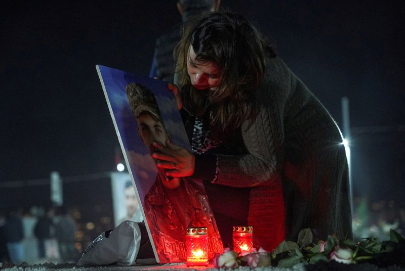 FILE PHOTO: Mourners commemorate Armenian service members killed in a