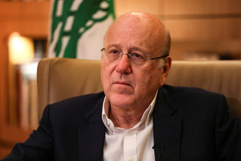 Lebanese Prime Minister Najib Mikati attends an interview with Reuters