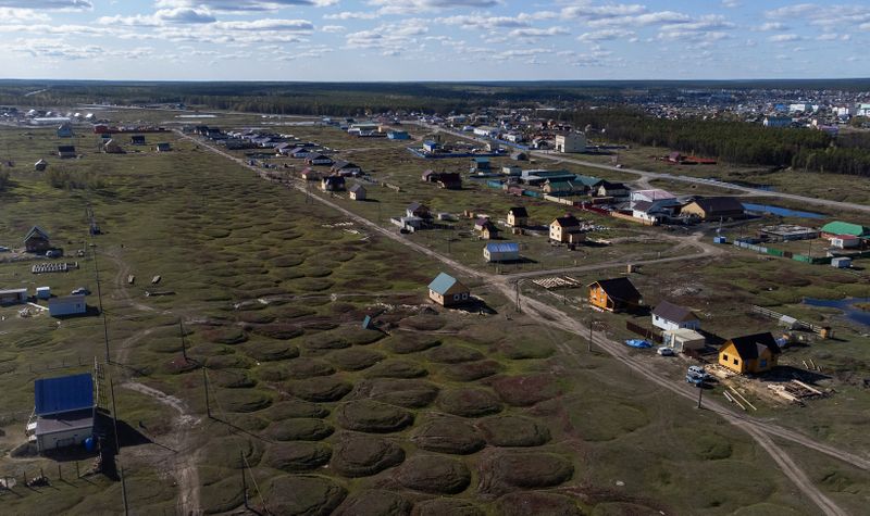 A drone picture shows private houses on a territory of
