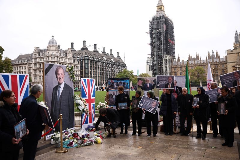 People pay tribute to late British MP David Amess, in