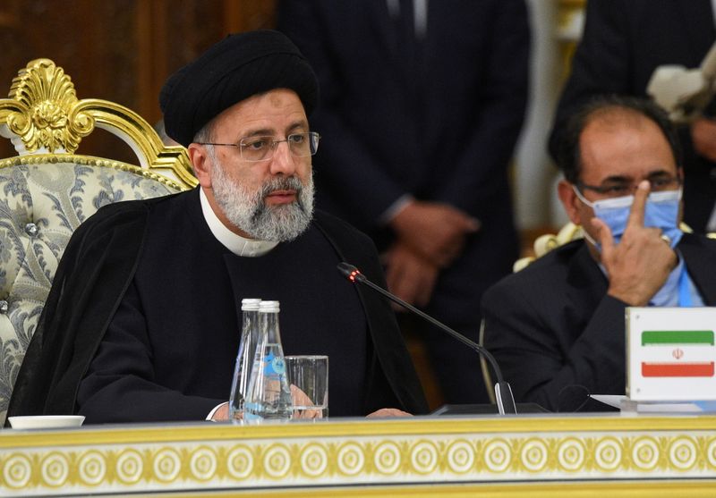 FILE PHOTO: Iranian President Ebrahim Raisi delivers a speech during