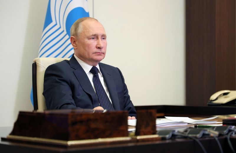 Russian President Putin attends a meeting with the heads of