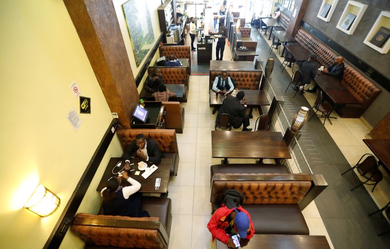 A general view shows clients inside the Cafe Deli restaurant