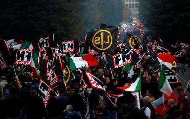 FILE PHOTO: Supporters of Italy’s far-right Forza Nuova party wave