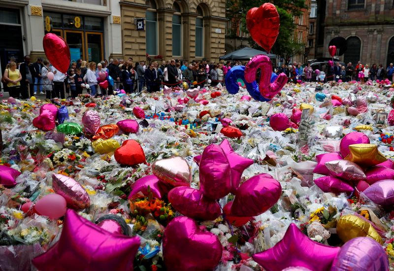 FILE PHOTO: Flowers and tributes to the victims of the