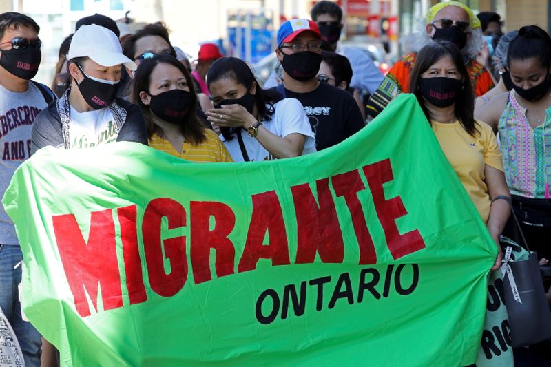 FILE PHOTO: Migrants, refugees, undocumented workers and their supporters rally