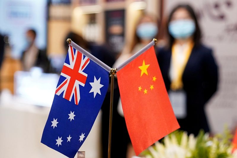 FILE PHOTO: Australian and Chinese flags are seen at the