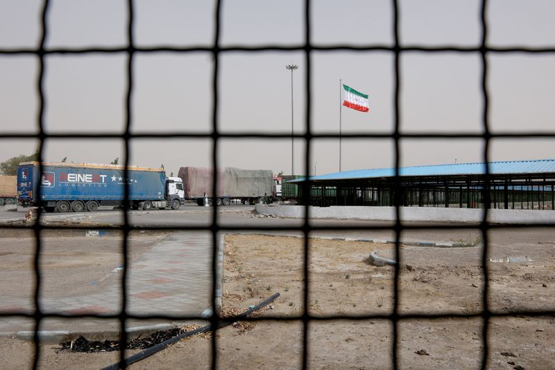 Iran’s flag is pictured at the Milak border crossing between