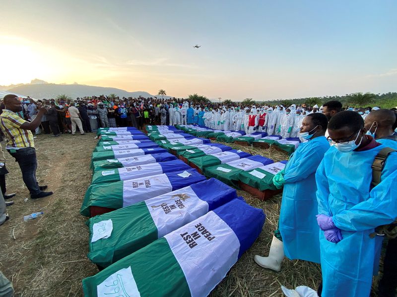 FILE PHOTO: Coffins containing the remains of victims of the