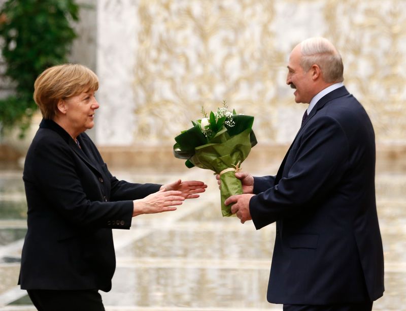 FILE PHOTO: Belarus’ President Lukashenko welcomes Germany’s Chancellor Merkel during