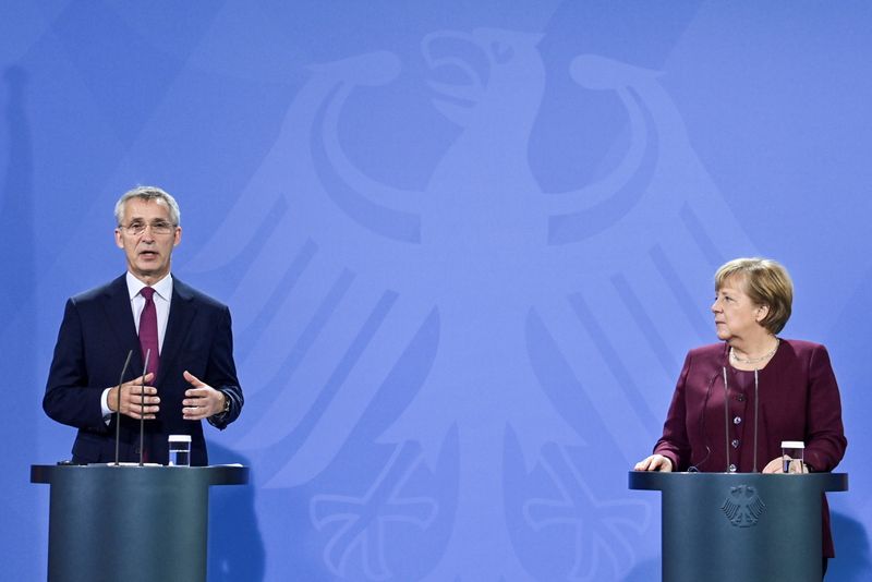 German Chancellor Angela Merkel receives NATO Secretary General Jens Stoltenberg