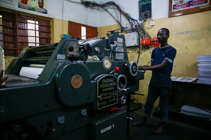 Man works at Gaza printing press in Maiduguri