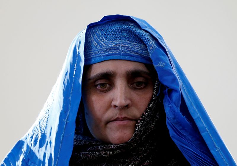 FILE PHOTO: Sharbat Gula, the green-eyed “Afghan Girl” whose 1985