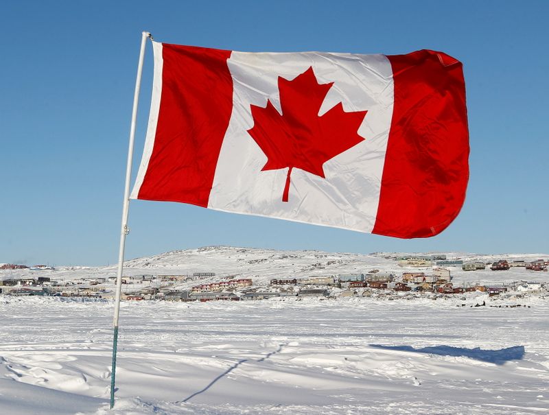 FILE PHOTO: A Canadian flag is pictured on Frobisher Bay