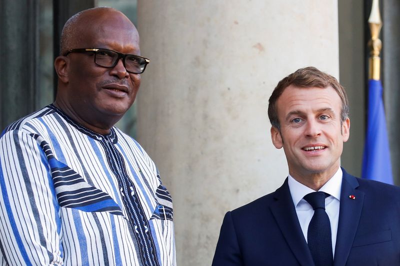 FILE PHOTO: French President Emmanuel Macron welcomes Burkina Faso’s President