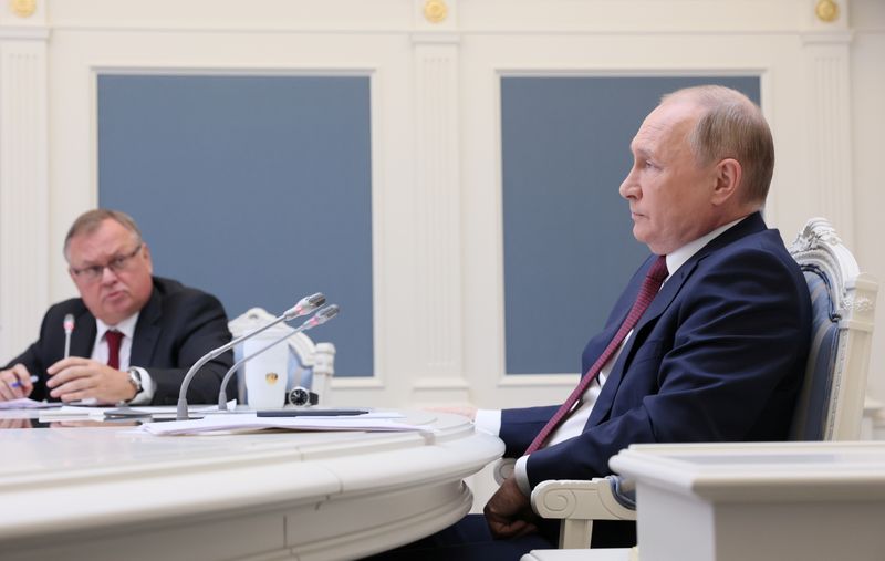Russian President Vladimir Putin and CEO of VTB bank Andrey