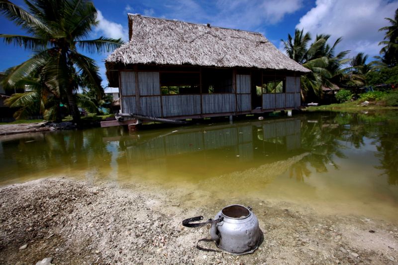 FILE PHOTO: An abandoned house that is affected by sea-water