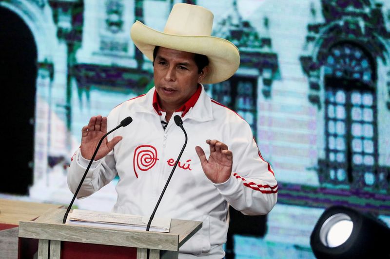 FILE PHOTO: Peru’s Pedro Castillo gestures during a debate in