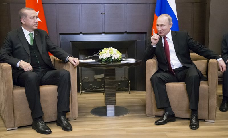 FILE PHOTO: Russian President Putin meets his Turkish counterpart Erdogan