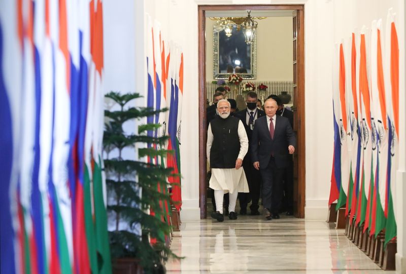 Russia’s President Putin attends a meeting with India’s Prime Minister