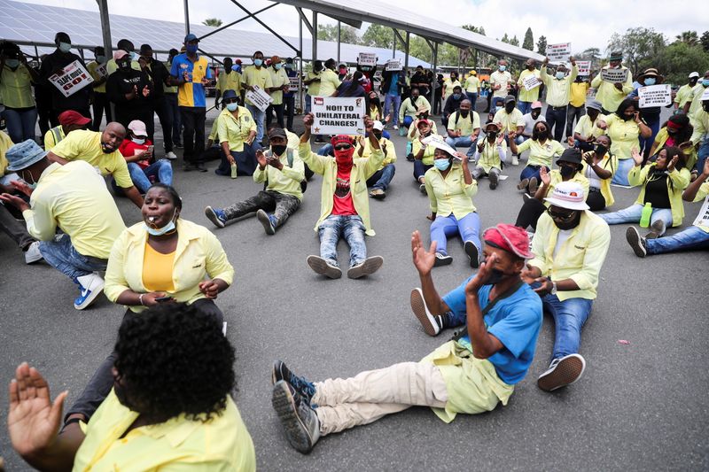 Workers go on strike outside a Walmart-led Massmart Holdings owned
