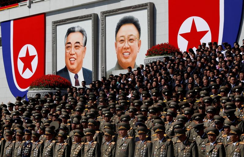 FILE PHOTO: North Korean senior military officials watch a parade