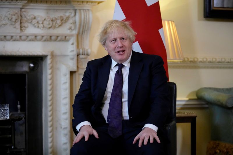 Britain’s Prime Minister Boris Johnson meets with Brunei’s Sultan Hassanal