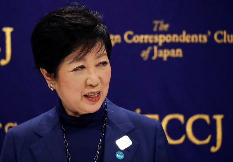 Tokyo Governor Yuriko Koike attends a news conference, amid the