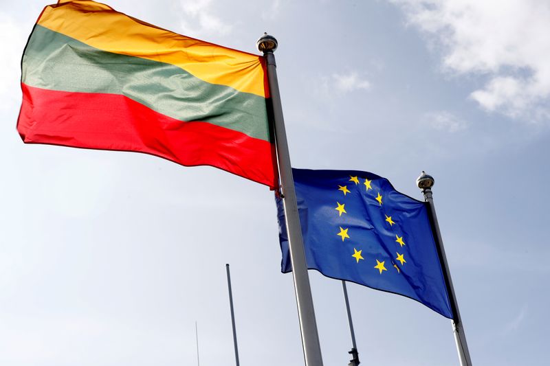 European Union and Lithuanian flags flutter at border crossing point