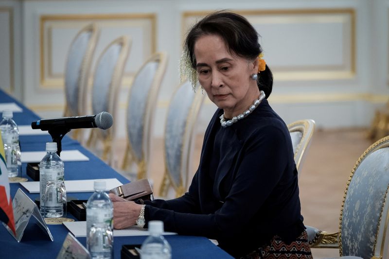FILE PHOTO: Myanmar’s State Counsellor Aung San Suu Kyi waits