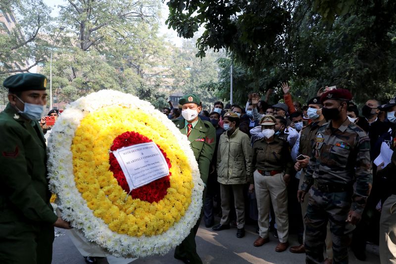 People pay their respects to India’s Chief of Defence Staff